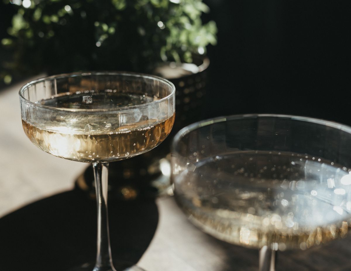 Champagne coupes in the sunlight