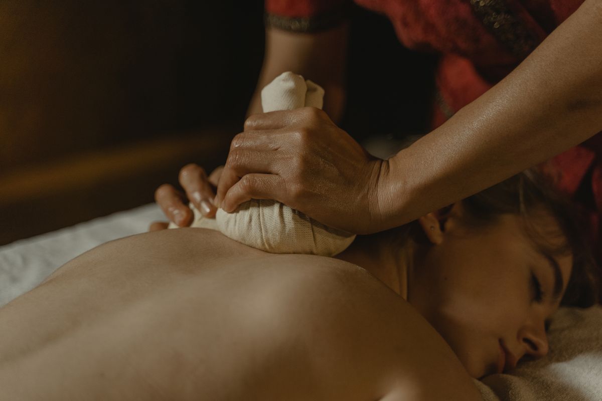 Hands giving a massage, close-up