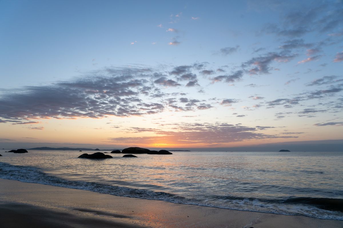 Sunrise over a calm sea